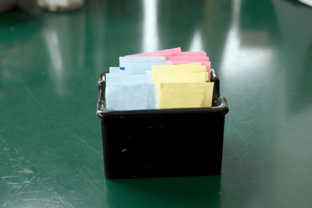 A container of tea bags on the table