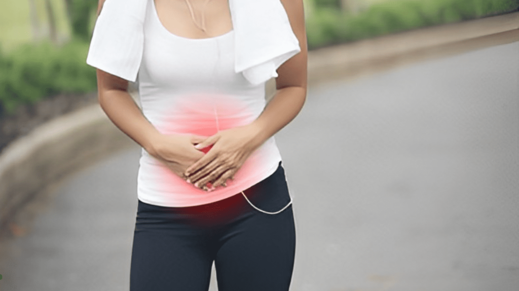 A woman holding her stomach in the middle of a road.